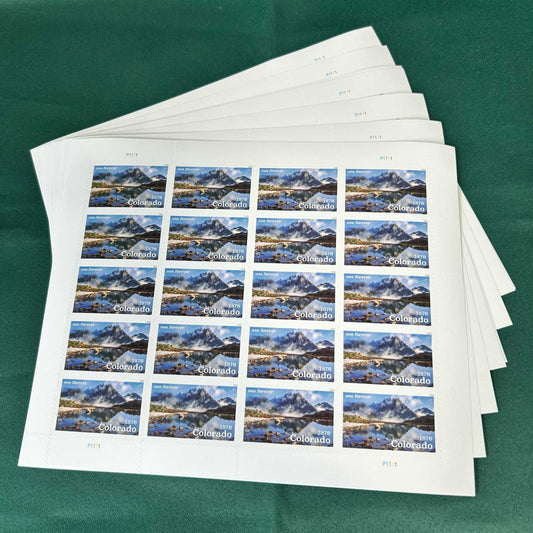 Sheet of 2026 Forever Stamps featuring Colorado statehood design by US STAMPS, showing colorful Colorado-themed illustrations.